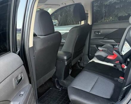 Чорний Міцубісі Аутлендер, об'ємом двигуна 2 л та пробігом 81 тис. км за 18950 $, фото 10 на Automoto.ua