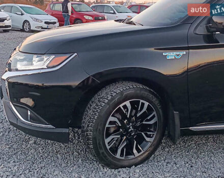 Чорний Міцубісі Аутлендер, об'ємом двигуна 2 л та пробігом 115 тис. км за 23700 $, фото 1 на Automoto.ua