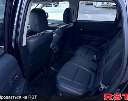 Черный Мицубиси Аутлендер, объемом двигателя 3 л и пробегом 115 тыс. км за 18200 $, фото 7 на Automoto.ua