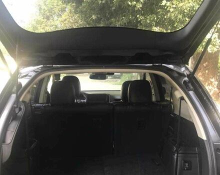 Черный Мицубиси Аутлендер, объемом двигателя 2.4 л и пробегом 125 тыс. км за 11200 $, фото 8 на Automoto.ua