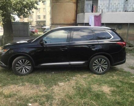 Черный Мицубиси Аутлендер, объемом двигателя 2.4 л и пробегом 125 тыс. км за 11200 $, фото 6 на Automoto.ua