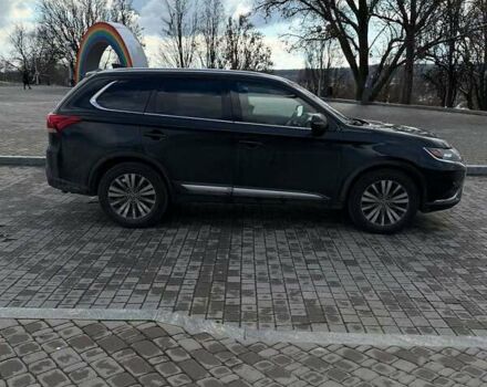 Черный Мицубиси Аутлендер, объемом двигателя 2.36 л и пробегом 91 тыс. км за 18300 $, фото 3 на Automoto.ua