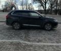Черный Мицубиси Аутлендер, объемом двигателя 2.36 л и пробегом 91 тыс. км за 18300 $, фото 3 на Automoto.ua