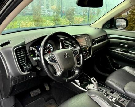 Чорний Міцубісі Аутлендер, об'ємом двигуна 2 л та пробігом 79 тис. км за 22900 $, фото 11 на Automoto.ua