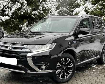 Черный Мицубиси Аутлендер, объемом двигателя 2 л и пробегом 65 тыс. км за 13200 $, фото 4 на Automoto.ua