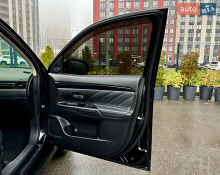 Чорний Міцубісі Аутлендер, об'ємом двигуна 2 л та пробігом 79 тис. км за 22900 $, фото 43 на Automoto.ua