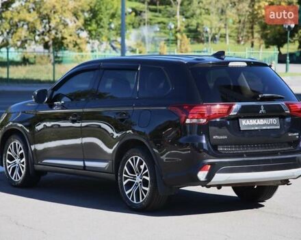 Черный Мицубиси Аутлендер, объемом двигателя 2.4 л и пробегом 130 тыс. км за 16200 $, фото 3 на Automoto.ua