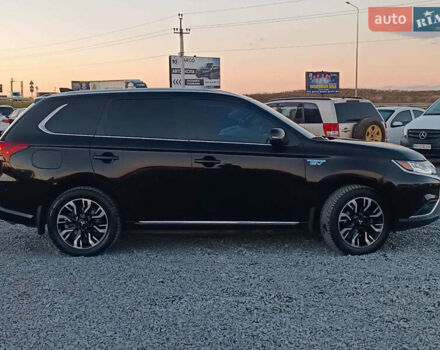 Чорний Міцубісі Аутлендер, об'ємом двигуна 2 л та пробігом 115 тис. км за 23700 $, фото 10 на Automoto.ua