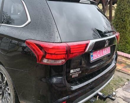 Чорний Міцубісі Аутлендер, об'ємом двигуна 2 л та пробігом 96 тис. км за 22000 $, фото 2 на Automoto.ua