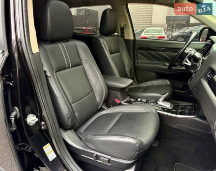 Чорний Міцубісі Аутлендер, об'ємом двигуна 2 л та пробігом 79 тис. км за 22900 $, фото 41 на Automoto.ua