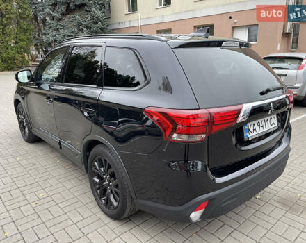 Чорний Міцубісі Аутлендер, об'ємом двигуна 2.36 л та пробігом 153 тис. км за 16450 $, фото 6 на Automoto.ua