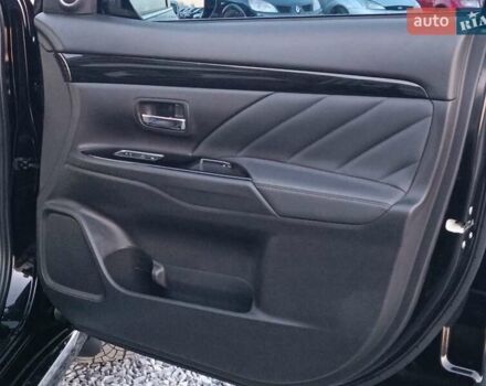 Чорний Міцубісі Аутлендер, об'ємом двигуна 2 л та пробігом 115 тис. км за 23700 $, фото 31 на Automoto.ua