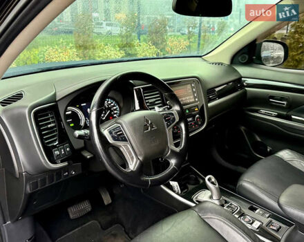 Чорний Міцубісі Аутлендер, об'ємом двигуна 2 л та пробігом 79 тис. км за 22900 $, фото 20 на Automoto.ua