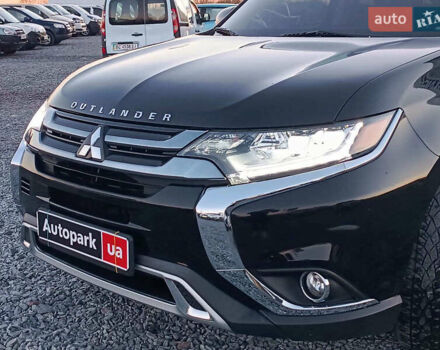 Чорний Міцубісі Аутлендер, об'ємом двигуна 2 л та пробігом 115 тис. км за 23700 $, фото 16 на Automoto.ua