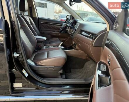 Черный Мицубиси Аутлендер, объемом двигателя 2 л и пробегом 67 тыс. км за 23000 $, фото 32 на Automoto.ua