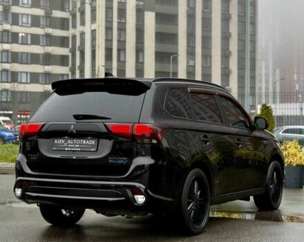 Чорний Міцубісі Аутлендер, об'ємом двигуна 2 л та пробігом 79 тис. км за 22900 $, фото 3 на Automoto.ua