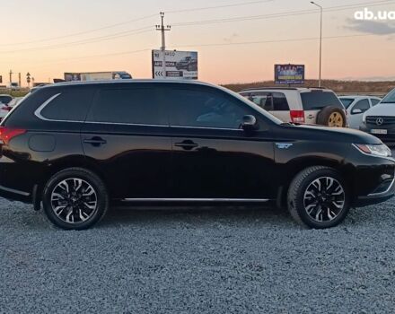 Черный Мицубиси Аутлендер, объемом двигателя 2 л и пробегом 115 тыс. км за 23700 $, фото 10 на Automoto.ua