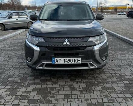 Черный Мицубиси Аутлендер, объемом двигателя 2.36 л и пробегом 91 тыс. км за 18300 $, фото 1 на Automoto.ua