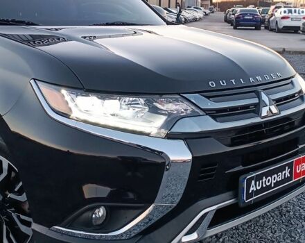 Черный Мицубиси Аутлендер, объемом двигателя 2 л и пробегом 115 тыс. км за 23700 $, фото 13 на Automoto.ua