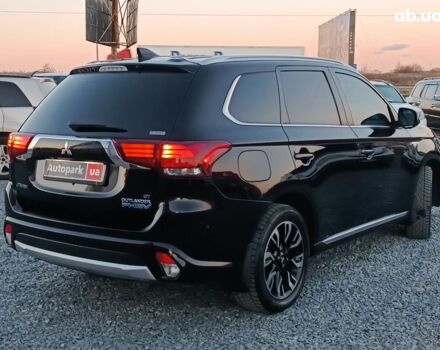 Черный Мицубиси Аутлендер, объемом двигателя 2 л и пробегом 115 тыс. км за 23700 $, фото 7 на Automoto.ua