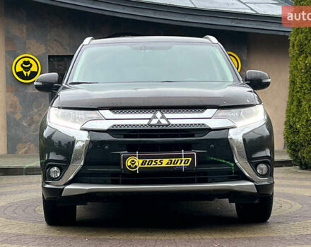 Черный Мицубиси Аутлендер, объемом двигателя 2 л и пробегом 96 тыс. км за 22750 $, фото 1 на Automoto.ua