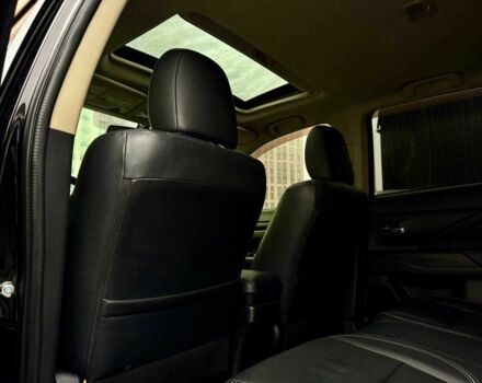 Чорний Міцубісі Аутлендер, об'ємом двигуна 2 л та пробігом 79 тис. км за 22900 $, фото 16 на Automoto.ua