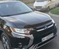 Черный Мицубиси Аутлендер, объемом двигателя 2.36 л и пробегом 149 тыс. км за 16400 $, фото 7 на Automoto.ua