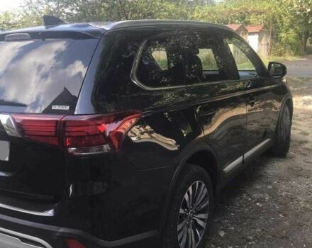 Черный Мицубиси Аутлендер, объемом двигателя 2.4 л и пробегом 125 тыс. км за 11200 $, фото 7 на Automoto.ua