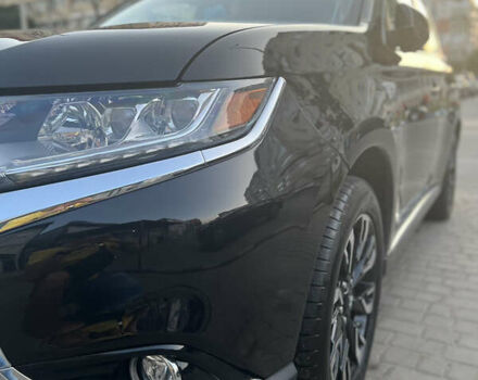 Чорний Міцубісі Аутлендер, об'ємом двигуна 2 л та пробігом 155 тис. км за 22500 $, фото 20 на Automoto.ua