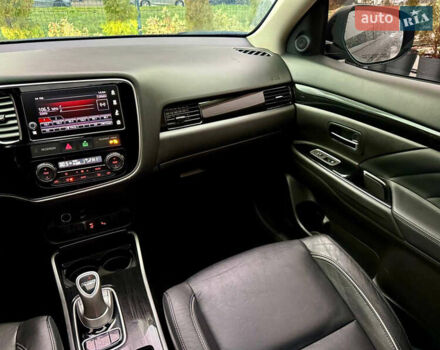 Чорний Міцубісі Аутлендер, об'ємом двигуна 2 л та пробігом 79 тис. км за 22900 $, фото 35 на Automoto.ua