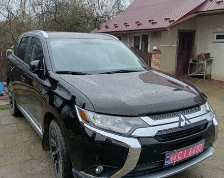 Чорний Міцубісі Аутлендер, об'ємом двигуна 2 л та пробігом 96 тис. км за 22000 $, фото 1 на Automoto.ua
