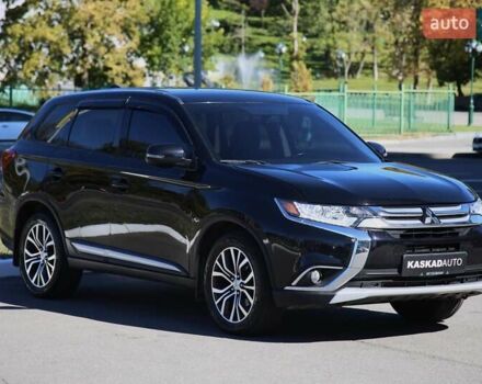 Черный Мицубиси Аутлендер, объемом двигателя 2.4 л и пробегом 130 тыс. км за 16200 $, фото 2 на Automoto.ua