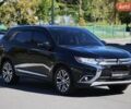 Черный Мицубиси Аутлендер, объемом двигателя 2.4 л и пробегом 130 тыс. км за 16200 $, фото 2 на Automoto.ua