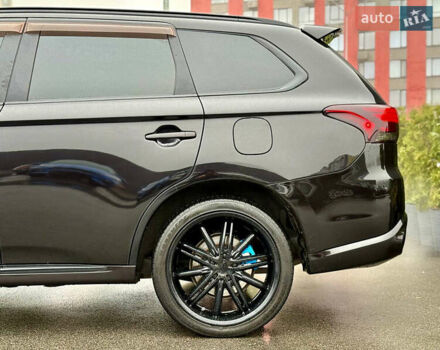 Чорний Міцубісі Аутлендер, об'ємом двигуна 2 л та пробігом 79 тис. км за 22900 $, фото 10 на Automoto.ua