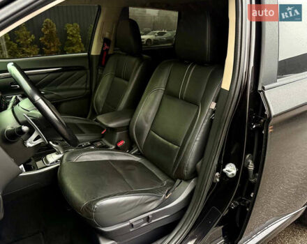 Чорний Міцубісі Аутлендер, об'ємом двигуна 2 л та пробігом 79 тис. км за 22900 $, фото 24 на Automoto.ua