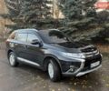 Чорний Міцубісі Аутлендер, об'ємом двигуна 2 л та пробігом 81 тис. км за 18950 $, фото 1 на Automoto.ua