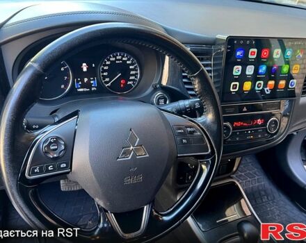 Черный Мицубиси Аутлендер, объемом двигателя 2 л и пробегом 150 тыс. км за 15900 $, фото 4 на Automoto.ua