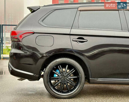 Чорний Міцубісі Аутлендер, об'ємом двигуна 2 л та пробігом 79 тис. км за 22900 $, фото 12 на Automoto.ua