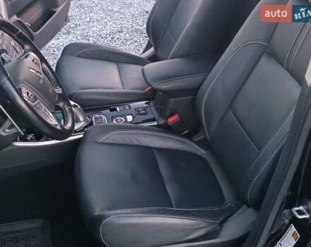 Чорний Міцубісі Аутлендер, об'ємом двигуна 2 л та пробігом 115 тис. км за 23700 $, фото 27 на Automoto.ua