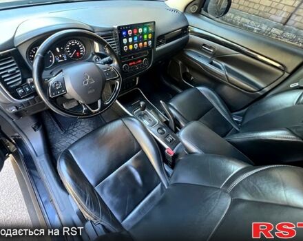 Черный Мицубиси Аутлендер, объемом двигателя 2 л и пробегом 150 тыс. км за 15900 $, фото 5 на Automoto.ua