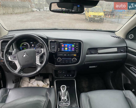 Черный Мицубиси Аутлендер, объемом двигателя 2 л и пробегом 76 тыс. км за 20800 $, фото 6 на Automoto.ua