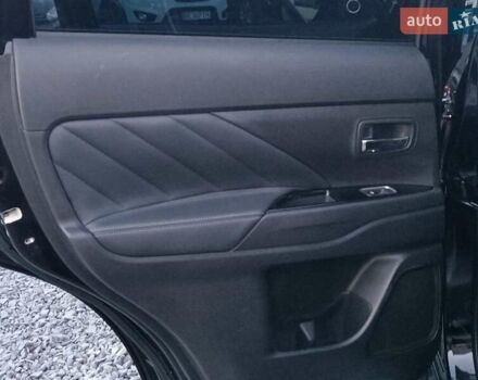 Чорний Міцубісі Аутлендер, об'ємом двигуна 2 л та пробігом 115 тис. км за 23700 $, фото 30 на Automoto.ua