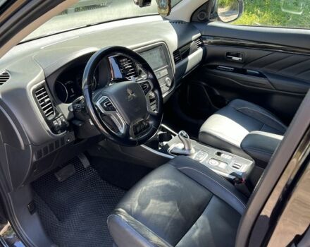 Черный Мицубиси Аутлендер, объемом двигателя 2 л и пробегом 54 тыс. км за 20800 $, фото 4 на Automoto.ua