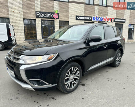 Чорний Міцубісі Аутлендер, об'ємом двигуна 2.36 л та пробігом 169 тис. км за 13450 $, фото 10 на Automoto.ua