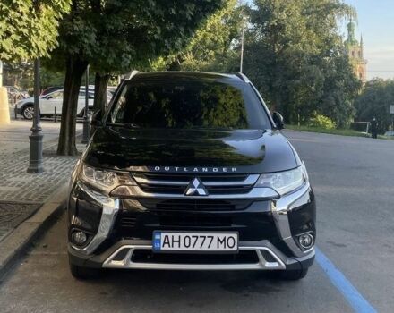 Чорний Міцубісі Аутлендер, об'ємом двигуна 2 л та пробігом 103 тис. км за 23500 $, фото 6 на Automoto.ua