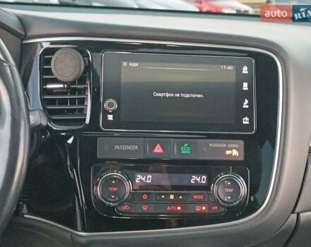 Чорний Міцубісі Аутлендер, об'ємом двигуна 2 л та пробігом 115 тис. км за 23700 $, фото 23 на Automoto.ua