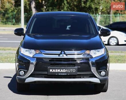 Черный Мицубиси Аутлендер, объемом двигателя 2.4 л и пробегом 130 тыс. км за 16200 $, фото 1 на Automoto.ua