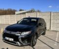 Чорний Міцубісі Аутлендер, об'ємом двигуна 2.36 л та пробігом 126 тис. км за 17500 $, фото 1 на Automoto.ua