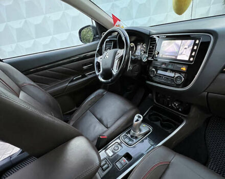 Чорний Міцубісі Аутлендер, об'ємом двигуна 2 л та пробігом 155 тис. км за 22500 $, фото 12 на Automoto.ua