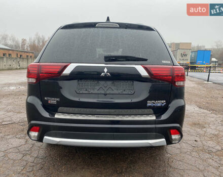 Черный Мицубиси Аутлендер, объемом двигателя 2 л и пробегом 76 тыс. км за 20800 $, фото 3 на Automoto.ua